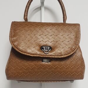 Handmade Brown Textured Faux Leather Rolled Handle Mini Handbag.